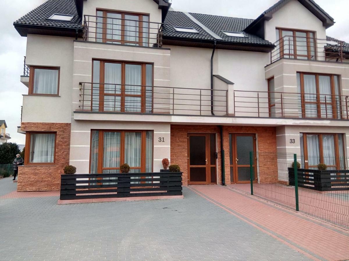 Stelle Apartments Leba Bagian luar foto
